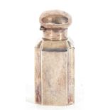 Victorian silver encased scent bottle of rectangular form with fluted corners, hinged lid,