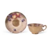 Royal Worcester cup and saucer, finely painted with fruit by Freeman, black mark to base, saucer