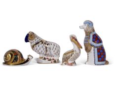 Group of Royal Crown Derby paperweights comprising a Ram, a garden Snail, (1558/4500) signed C