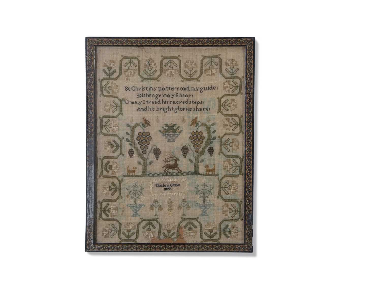 19th century needlework sampler decorated with central panel of a stag and animals under vines and