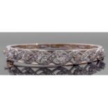 Diamond set hinged bracelet, featuring seven round graduated Victorian cut diamonds, 3.0ct approx,