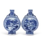 Two large Chinese porcelain moon flasks, both decorated with lake scenes and figures within