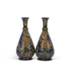 Large pair of Lambeth Doulton faience vases of pear shape, decorated with floral designs on a blue