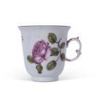 Mid-18th century Meissen chocolate cup, finely decorated in botanical style with a rose and