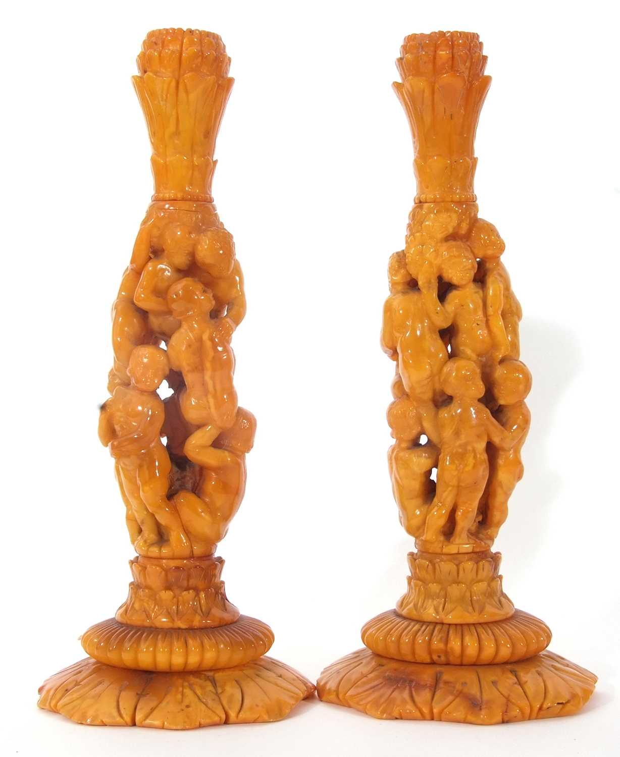 Pair of mid 19th century natural Baltic amber candlesticks (possibly German), having Corinthian