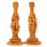 Pair of mid 19th century natural Baltic amber candlesticks (possibly German), having Corinthian