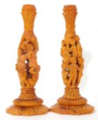Pair of mid 19th century natural Baltic amber candlesticks (possibly German), having Corinthian