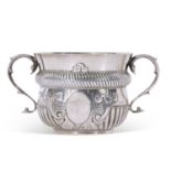 Edwardian silver two-handled poringer in 17th century style of circular baluster form with reeded