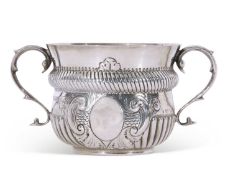 Edwardian silver two-handled poringer in 17th century style of circular baluster form with reeded