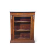 Victorian walnut veneered pier cabinet with applied metal detail, single glazed door opening to a