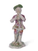 Derby model of a boy piper circa 1765, 13cm high