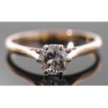 Single stone diamond ring, the round brilliant cut diamond, 0.65ct approx, multi-claw set and raised