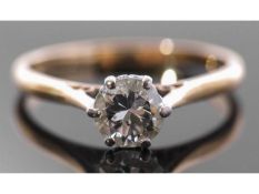 Single stone diamond ring, the round brilliant cut diamond, 0.65ct approx, multi-claw set and raised