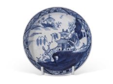 Lowestoft porcelain saucer, circa 1780, with a pagoda and river scene within an elaborate hatched