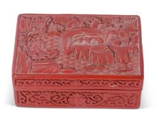 Chinese cinnabar cigar box, the lid modelled with a mountainous scene, 16cm long. Provenance: the