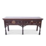 17th century and later dresser base in the Jacobean style, the boarded top over two drawers with
