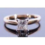Diamond solitaire ring, the Princess cut diamond weighing approx 1ct, raised in a four prong