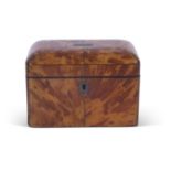 Mid-19th century tortoiseshell veneered tea caddy with pewter divisional inlays, the lid opening