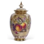 A Royal Worcester vase and reticulated cover decorated with fruit on a mossy ground, signed J