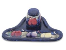 Mid-20th century Moorcroft pottery inkwell with the Wisteria pattern, stamp and signature to base,