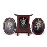 Japanese late Meiji period fire screen and two oval panels, all with intricate ivory floral