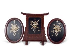 Japanese late Meiji period fire screen and two oval panels, all with intricate ivory floral