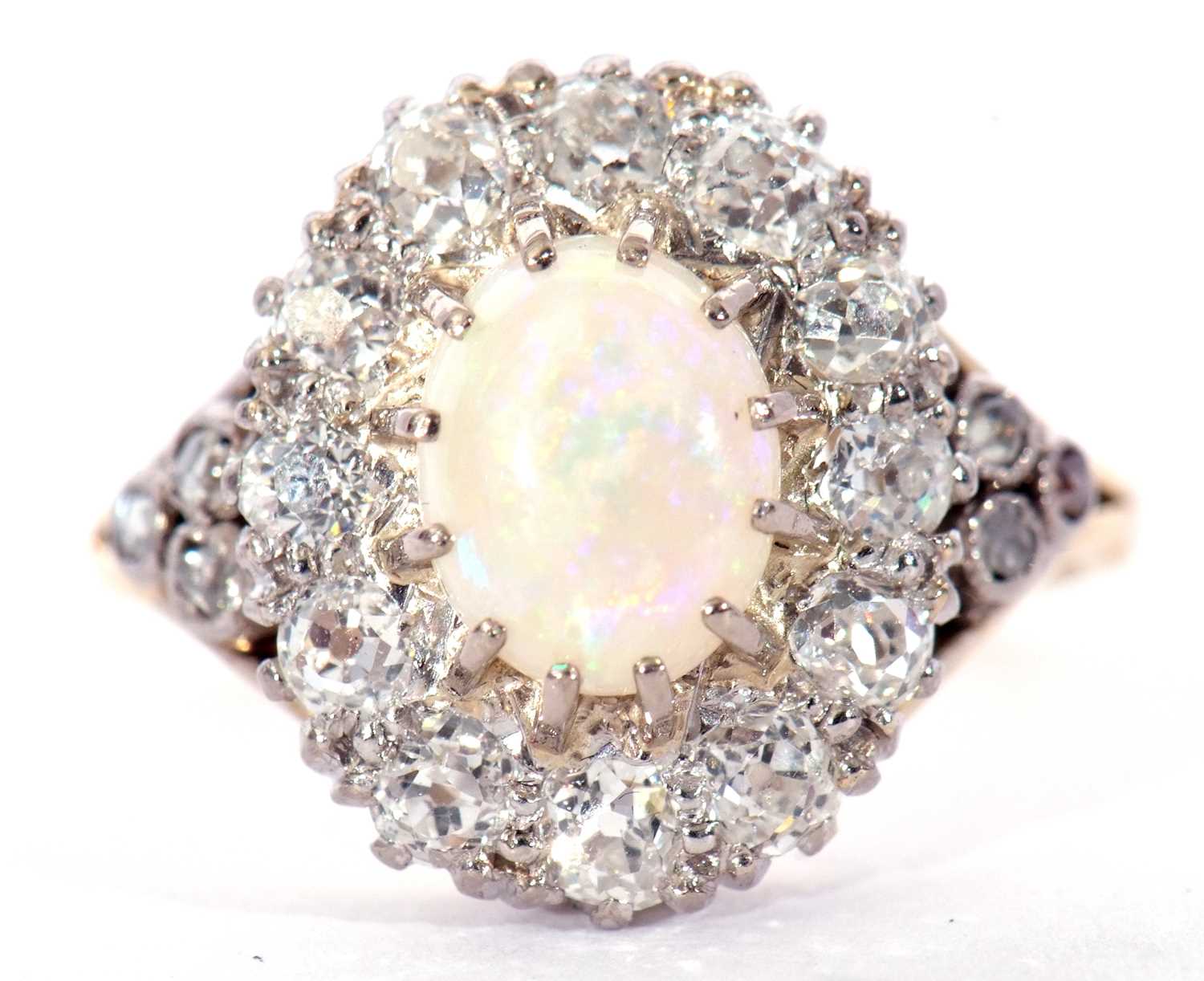 Opal and diamond cluster ring centring an oval shaped cabochon opal, multi-claw set and raised above - Image 7 of 7