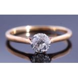 Single stone diamond ring, the old cut diamond 0.04ct approx, raised between upswept shoulders,