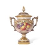 Large Royal Worcester vase with reticulated cover and gilt handles, the vase finely painted with