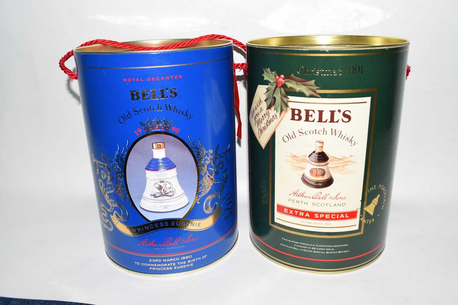 Two collectable Bells Whisky Decanters, by Wade: 1 1991 Christmas Bells Decanter (boxed) 1 1990