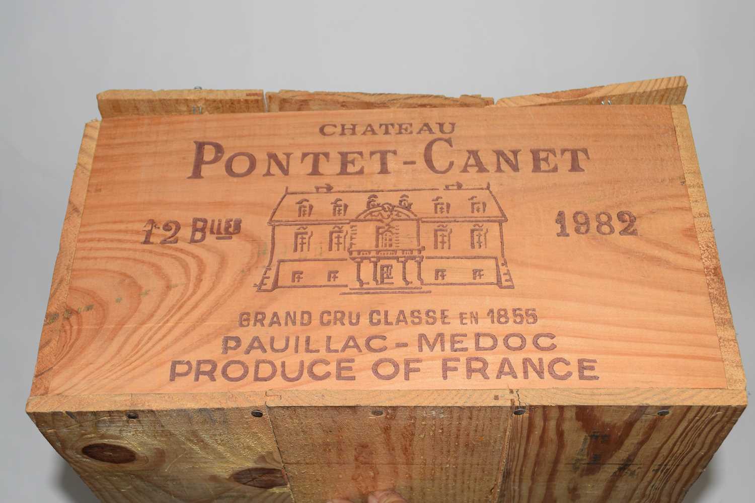 A 1982 Ch Pontet Canet Original Wooden Case; t/w a 2001 Ch Belair Original Wooden Case - nb both
