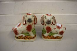 PAIR OF REPRODUCTION STAFFORDSHIRE MODELS OF RABBITS