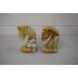 PAIR OF POLISHED ONYX HORSE SHAPED BOOKENDS