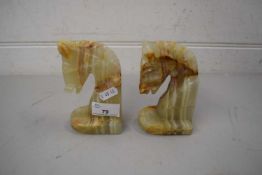 PAIR OF POLISHED ONYX HORSE SHAPED BOOKENDS