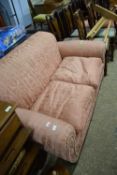 PINK UPHOLSTERED TWO-SEATER SOFA