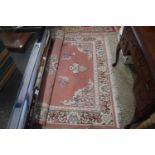 MODERN WOOL FLOOR RUG DECORATED WITH LARGE CENTRAL PANEL ON A PINK BACKGROUND, 170CM WIDE