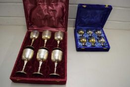 TWO CASES OF SILVER PLATED GOBLETS