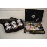 CASED SET OF FRENCH METAL BOULE BALLS TOGETHER WITH AN ARTISTS PAINT TIN (2)