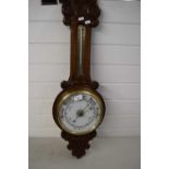 LATE 19TH CENTURY OAK CASED ANEROID BAROMETER AND THERMOMETER