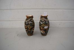 PAIR OF SMALL JAPANESE SATSUMA VASES DECORATED WITH FIGURES AND DRAGONS