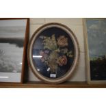 LATE 19TH/EARLY 20TH CENTURY NEEDLE AND FABRIC WORK STUDY OF A BUNCH OF FLOWERS SET IN AN OVAL FRAME