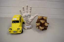 POTTERY MODEL OF A CITROEN 2CV TOGETHER WITH A MODEL OF MONKS AND A PALMISTRY MODEL