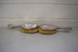 PAIR OF SILVER BACKED DRESSING TABLE HAND BRUSHES WITH ENGINE TURNED DECORATION, HALLMARKED LONDON