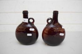 TWO AMBER GLASS SPIRIT DECANTERS