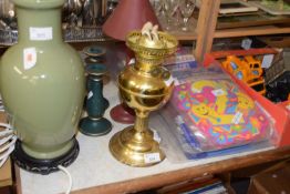 MIXED LOT MODERN BRASS OIL LAMP AND THREE CANDLESTICKS (4)