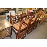 SET OF SIX UPHOLSTERED DINING CHAIRS WITH INLAID DECORATION