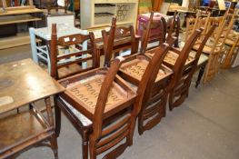 SET OF SIX UPHOLSTERED DINING CHAIRS WITH INLAID DECORATION