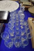 COLLECTION OF CLEAR DRINKING GLASSES AND TWO DECANTERS