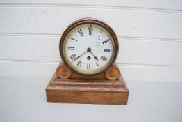 LATE 19TH/EARLY 20TH CENTURY MANTEL CLOCK WITH FADED HARDWOOD CASE