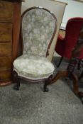 VICTORIAN MAHOGANY FRAMED NURSING CHAIR WITH FLORAL UPHOLSTERY